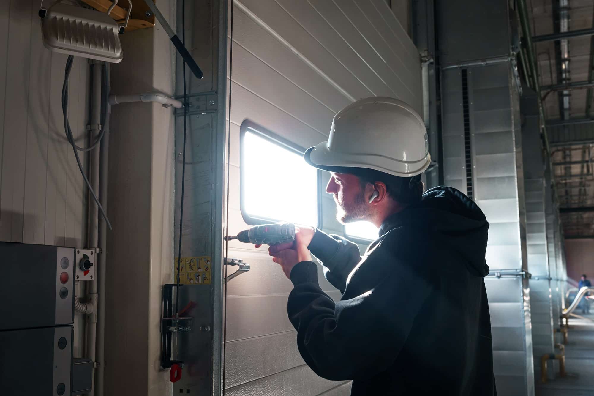 Engineer repairing an unloading gate